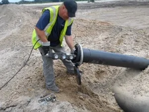 The self-propelling equipment that carries the nozzle through the pipe.