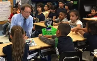 Bruce Clark answers questions about bugs at Crestwood Elementary.