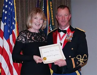 Sharon Bison receiving SAME Sustaining Member Award 2017 presented to SCS Engineers by the Society of American Military Engineers