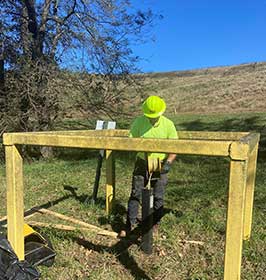 Brian monitoring a landfill well